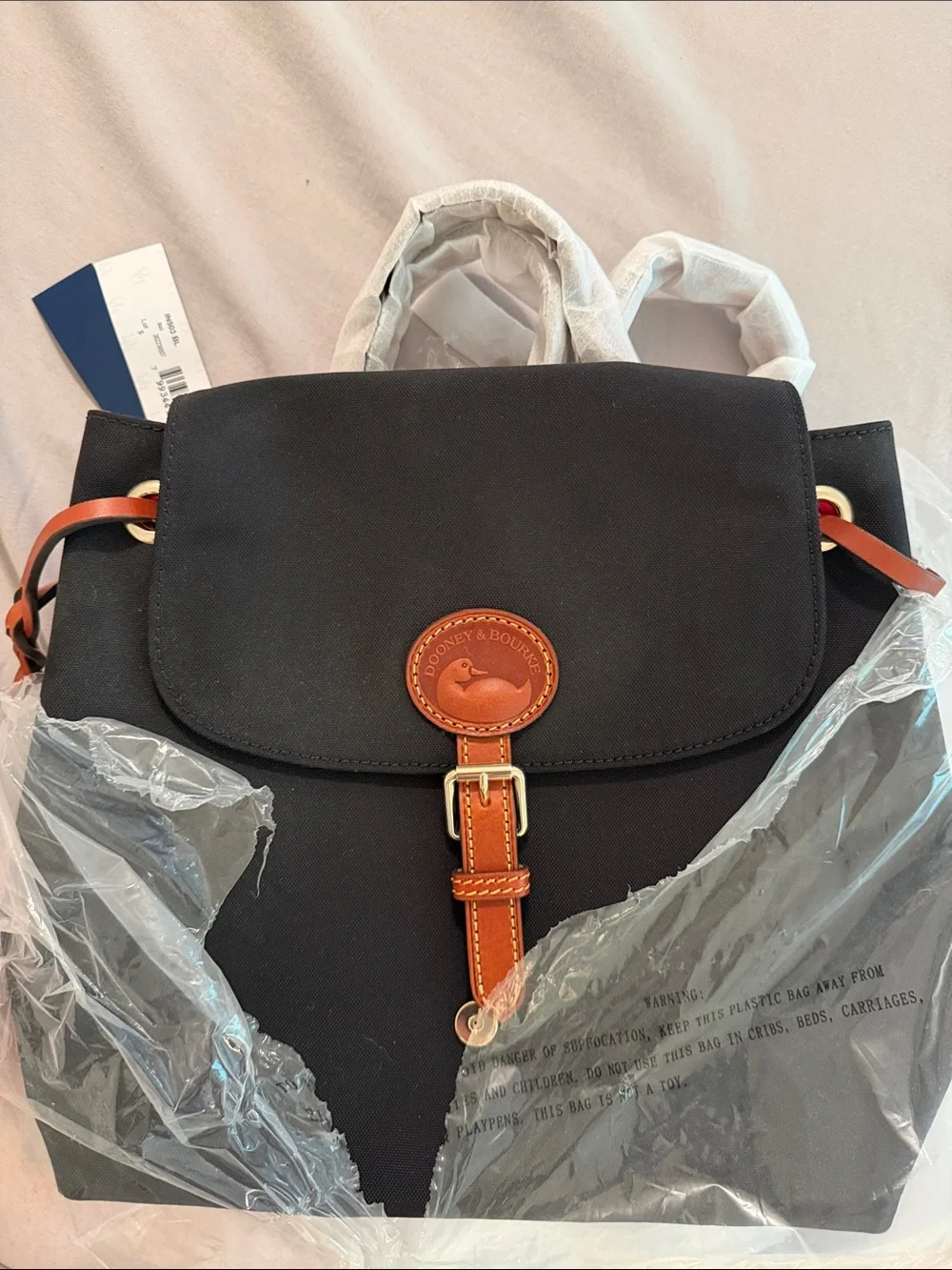 Dooney & Bourke Black Nylon Backpack with Brown Leather Trim